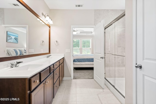 21 Heathrow Ave, Bluffton, SC 29910 - bathroom featuring ensuite bath, double vanity, tile patterned floors, and tiled shower