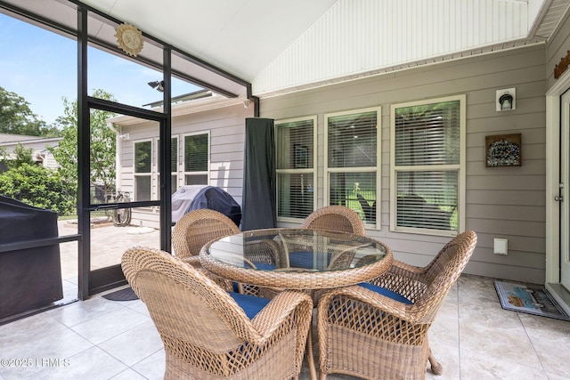21 Heathrow Ave, Bluffton, SC 29910 - sunroom with vaulted ceiling and outdoor dining area
