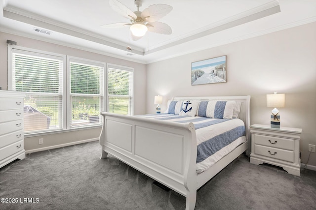 21 Heathrow Ave, Bluffton, SC 29910 - carpeted bedroom featuring ornamental molding, a raised ceiling, and ceiling fan