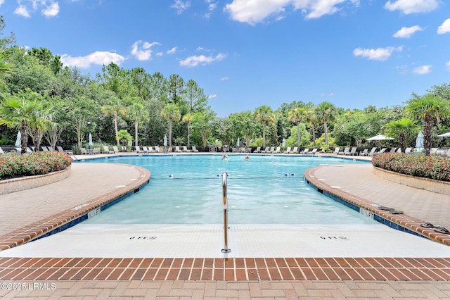 21 Heathrow Ave, Bluffton, SC 29910 - community pool featuring view of scattered trees and a patio area