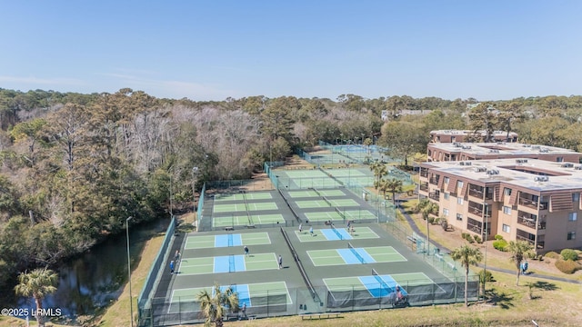 aerial view featuring a wooded view