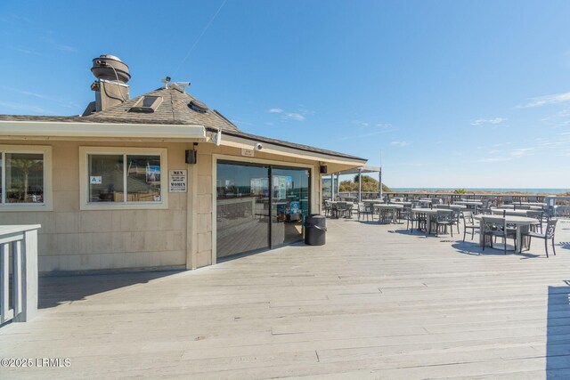 wooden deck with outdoor dining space