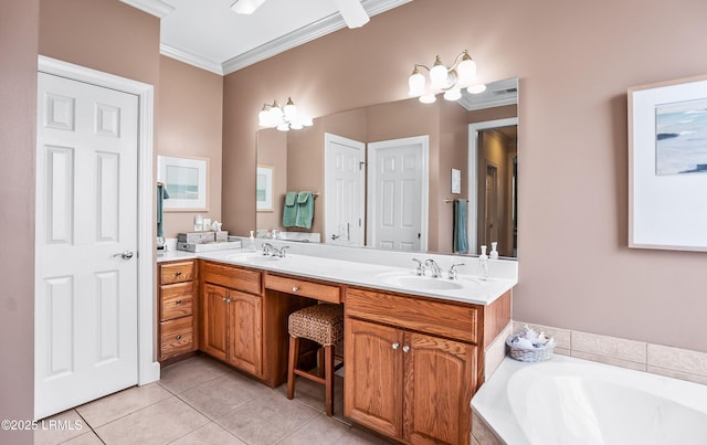 bathroom featuring crown molding, tile patterned floors, a relaxing tiled tub, and vanity