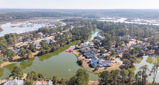 drone / aerial view featuring a water view