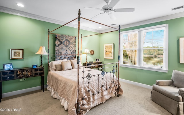 bedroom with crown molding, carpet floors, and ceiling fan