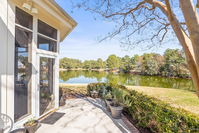 view of patio / terrace featuring a water view