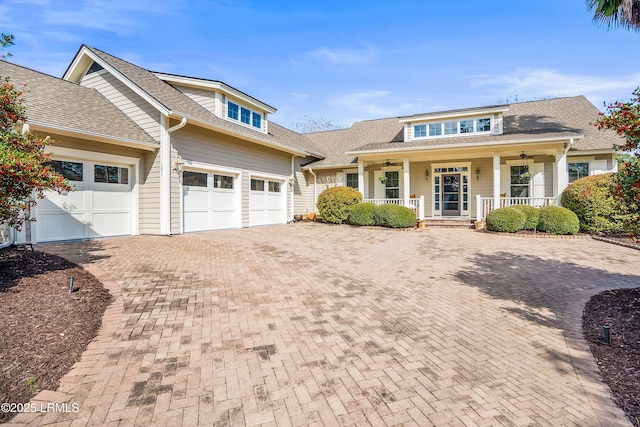 view of front of home featuring a garage and covered porch