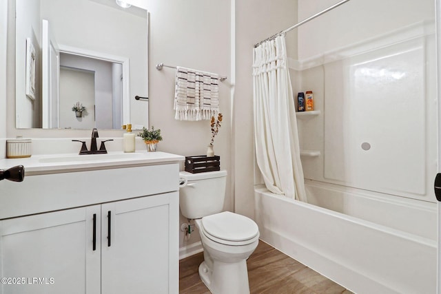 full bathroom featuring vanity, wood-type flooring, toilet, and shower / bath combo