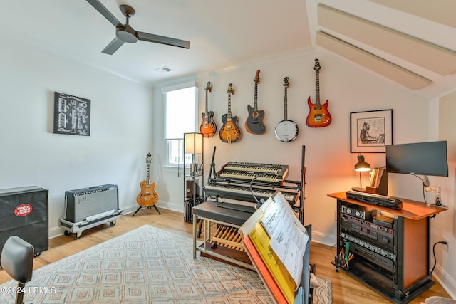 miscellaneous room with ceiling fan and light hardwood / wood-style floors