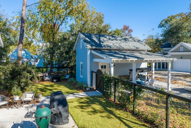 view of home's exterior with a lawn