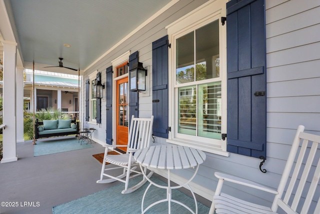 view of patio featuring a porch and ceiling fan