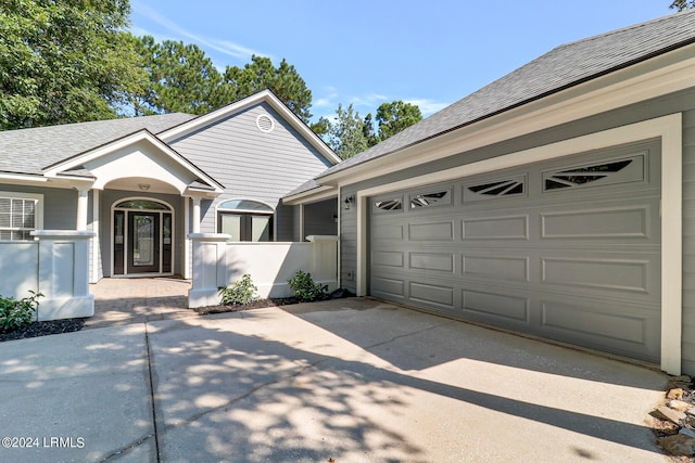 view of front of house with a garage