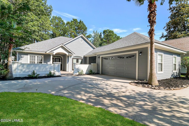 view of front of property featuring a garage