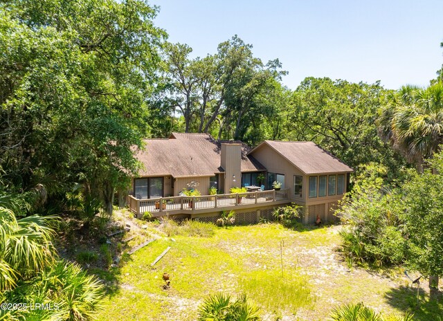 905 Gull Cv, Fripp Island, SC 29920 - back of property featuring a deck and a chimney