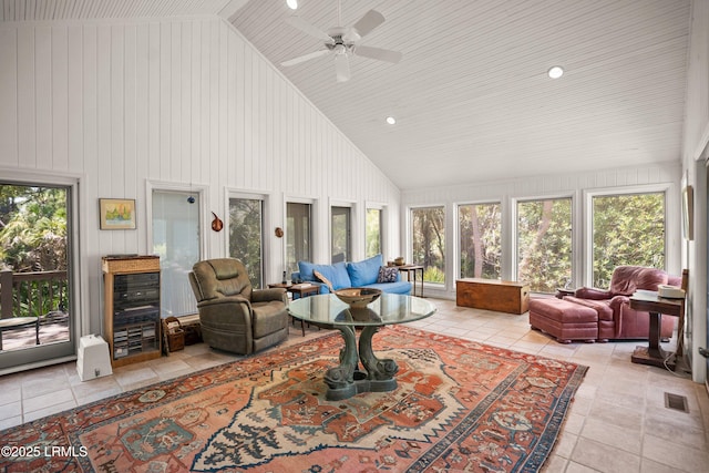 905 Gull Cv, Fripp Island, SC 29920 - living room with light tile patterned flooring, high vaulted ceiling, and a ceiling fan