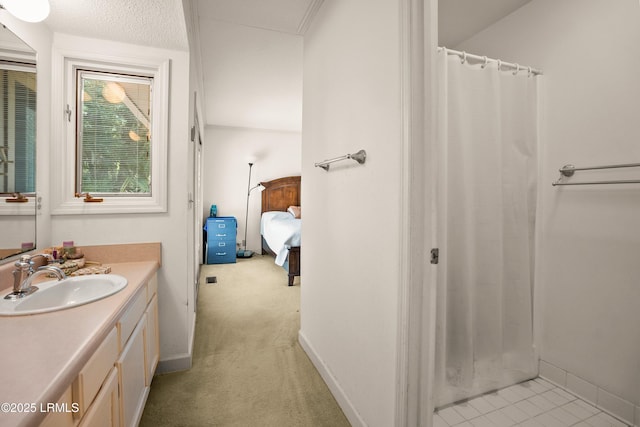 905 Gull Cv, Fripp Island, SC 29920 - full bathroom with vanity, connected bathroom, and a shower with curtain