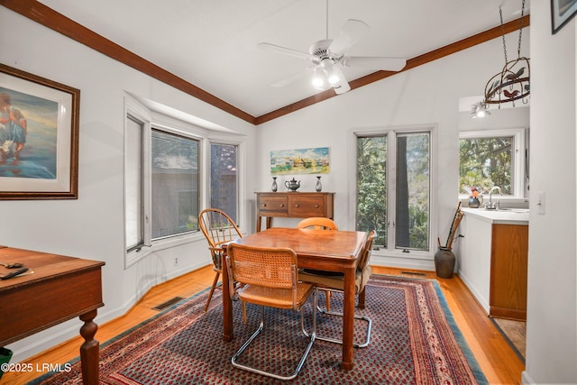 905 Gull Cv, Fripp Island, SC 29920 - dining space featuring vaulted ceiling, light wood-type flooring, and a ceiling fan