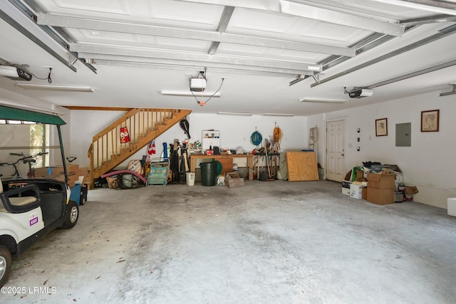 905 Gull Cv, Fripp Island, SC 29920 - garage featuring electric panel and a garage door opener