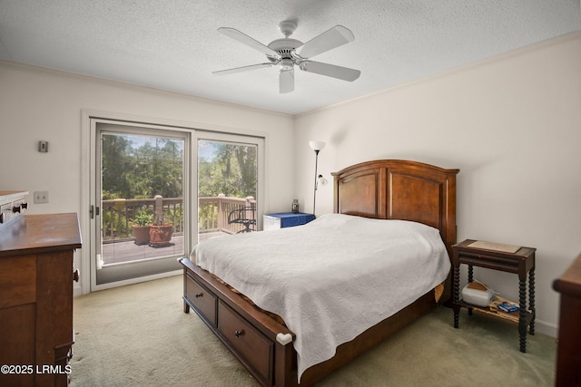 905 Gull Cv, Fripp Island, SC 29920 - bedroom with access to outside, light carpet, a textured ceiling, and a ceiling fan