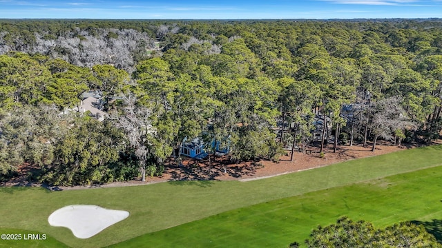 drone / aerial view with a view of trees