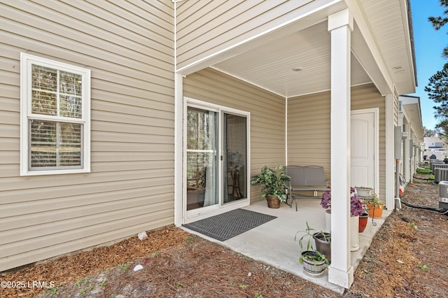 doorway to property featuring a patio area