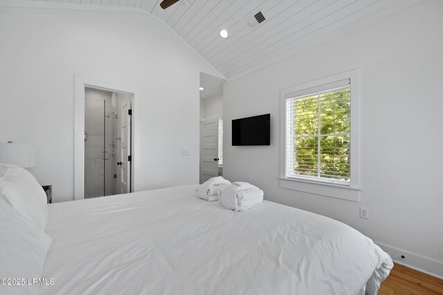 142 President St, Charleston, SC 29403 - bedroom featuring wood finished floors, lofted ceiling, recessed lighting, ensuite bath, and baseboards