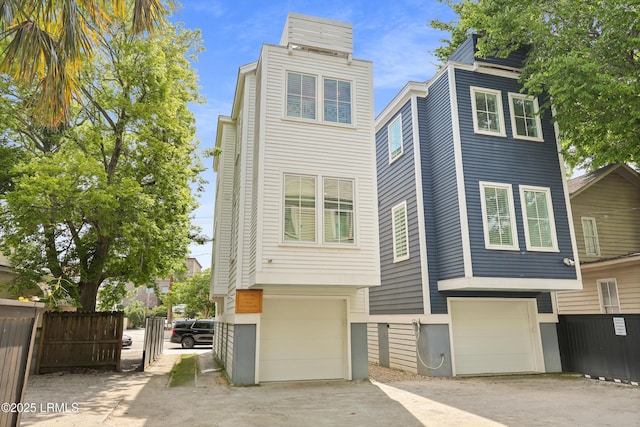142 President St, Charleston, SC 29403 - view of front of property with a garage