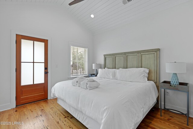 142 President St, Charleston, SC 29403 - bedroom featuring wood finished floors and high vaulted ceiling