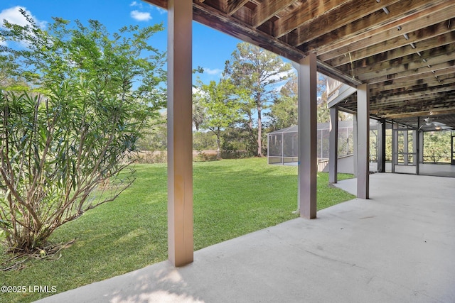 1812 Dolphin Row Dr, Beaufort, SC 29906 - view of green lawn featuring a patio area and glass enclosure