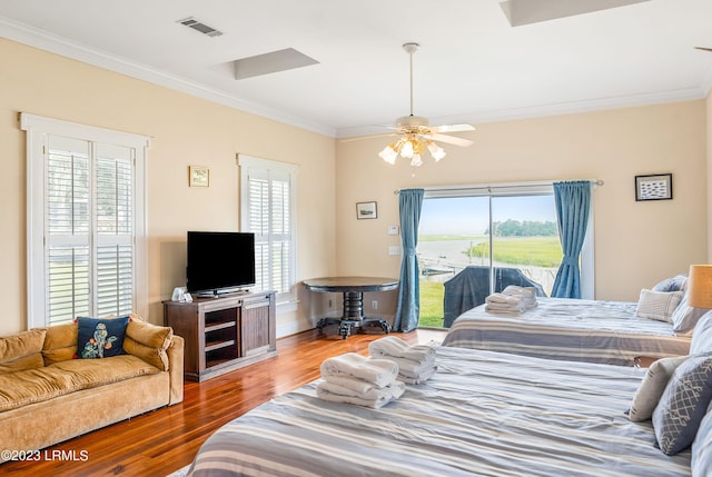 bedroom with crown molding, ceiling fan, hardwood / wood-style floors, and access to outside