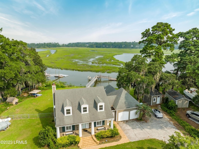 drone / aerial view with a water view