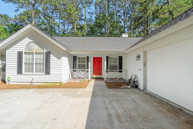 4 Moultrie Ct, Beaufort, SC 29907 - single story home featuring a garage, driveway, covered porch, a chimney, and roof with shingles