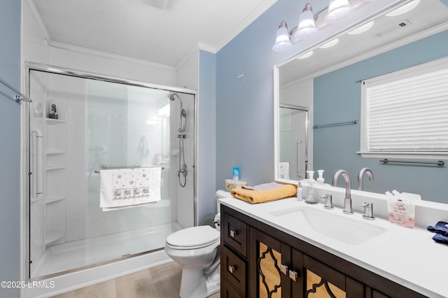 4 Moultrie Ct, Beaufort, SC 29907 - bathroom featuring ornamental molding, vanity, a stall shower, toilet, and wood finished floors