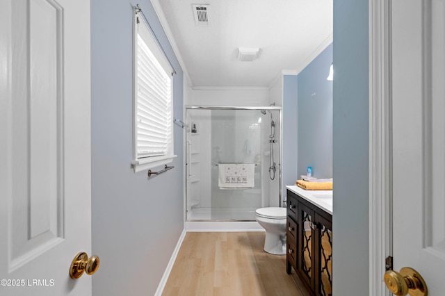 4 Moultrie Ct, Beaufort, SC 29907 - full bath featuring toilet, a shower stall, wood finished floors, vanity, and crown molding