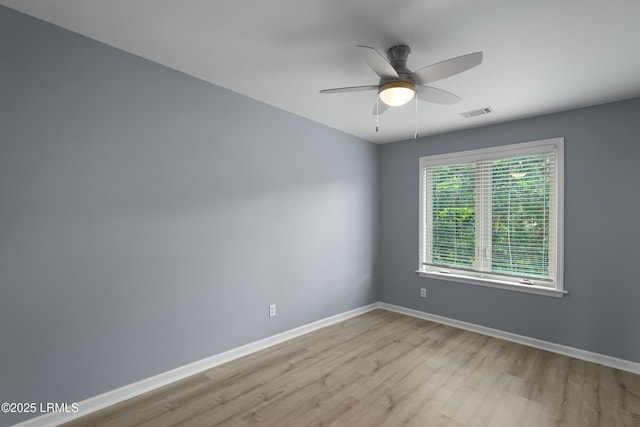 269 Ceasar Pl, Hilton Head Island, SC 29926 - spare room with wood finished floors, baseboards, and ceiling fan