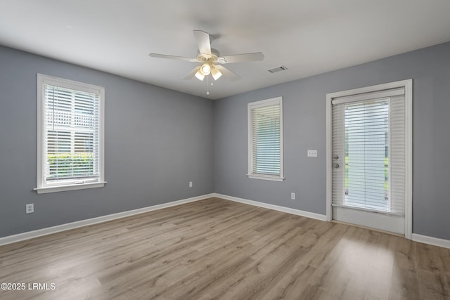 269 Ceasar Pl, Hilton Head Island, SC 29926 - unfurnished room featuring wood finished floors, ceiling fan, and baseboards