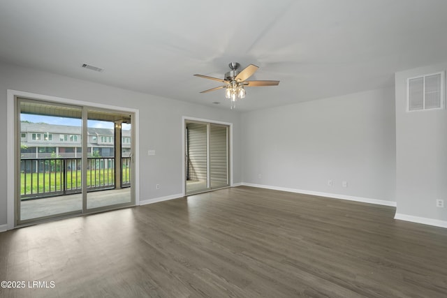 269 Ceasar Pl, Hilton Head Island, SC 29926 - spare room with ceiling fan, baseboards, and dark wood-type flooring