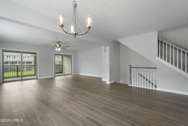 269 Ceasar Pl, Hilton Head Island, SC 29926 - unfurnished living room with a chandelier, ceiling fan, wood finished floors, and baseboards