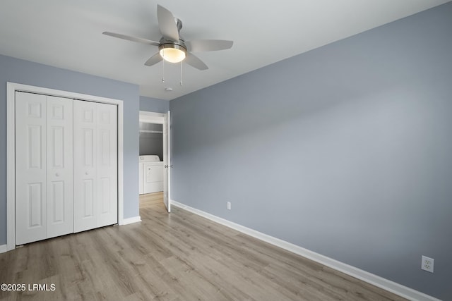 269 Ceasar Pl, Hilton Head Island, SC 29926 - unfurnished bedroom with washer and clothes dryer, wood finished floors, baseboards, a closet, and a ceiling fan