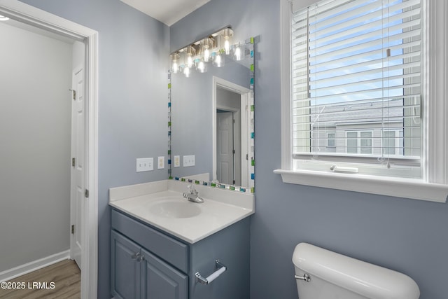 269 Ceasar Pl, Hilton Head Island, SC 29926 - half bath featuring vanity, wood finished floors, toilet, and baseboards