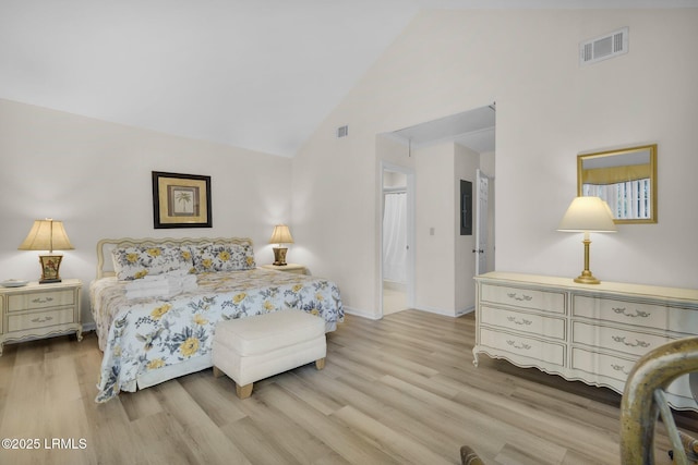 70 Shipyard Dr Unit 166, Hilton Head Island, SC 29928 - bedroom with high vaulted ceiling, wood finished floors, and baseboards