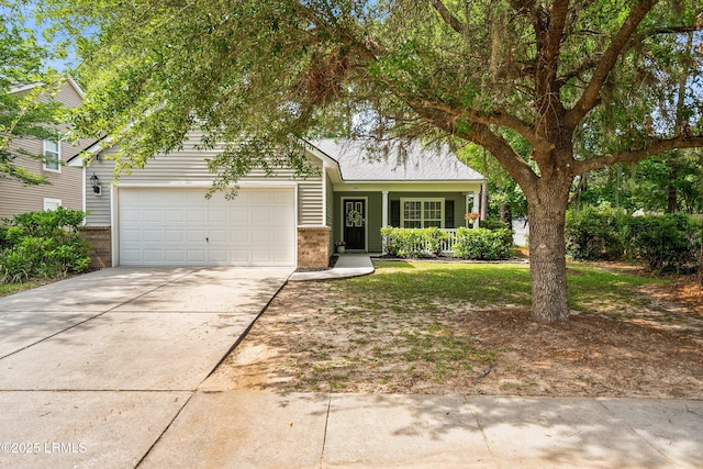 106 Winyah Way, Beaufort, SC 29906 - view of front of house with concrete driveway, a garage, covered porch, and brick siding