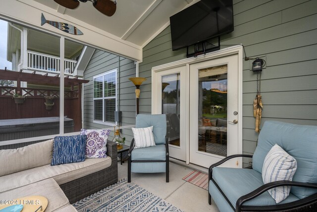 view of patio with an outdoor hangout area and ceiling fan