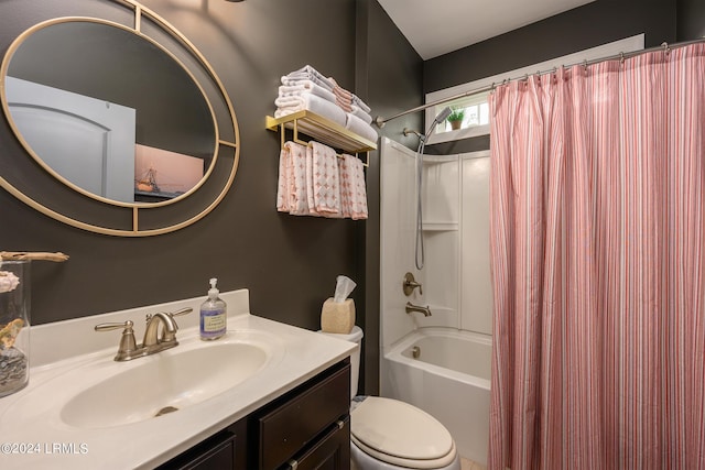 full bathroom featuring shower / tub combo, vanity, and toilet