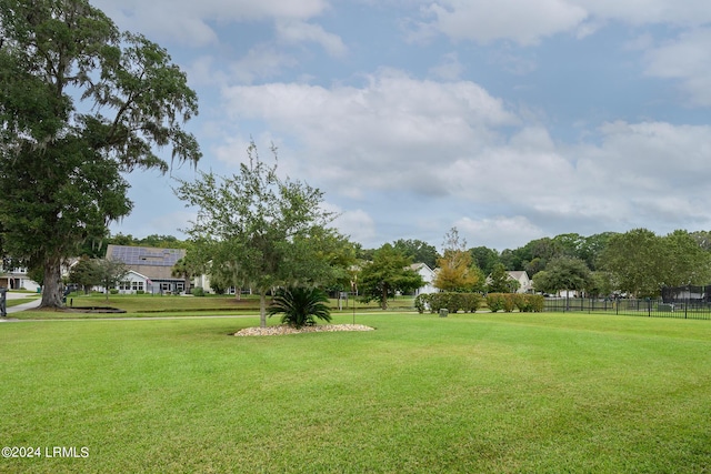 view of community featuring a lawn