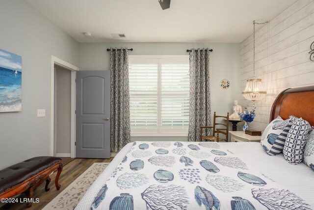 bedroom with wood-type flooring