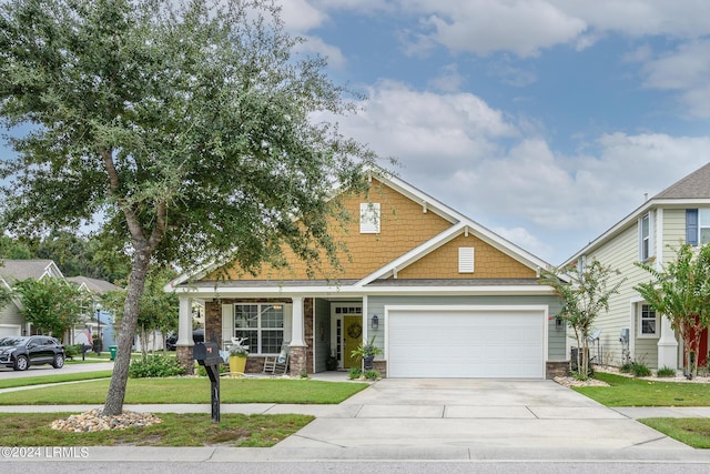 craftsman inspired home with a front lawn