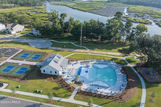 birds eye view of property with a water view