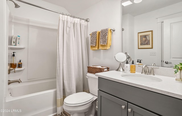 full bathroom with vanity, toilet, and shower / bath combo with shower curtain