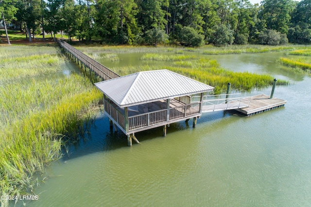 dock area featuring a water view